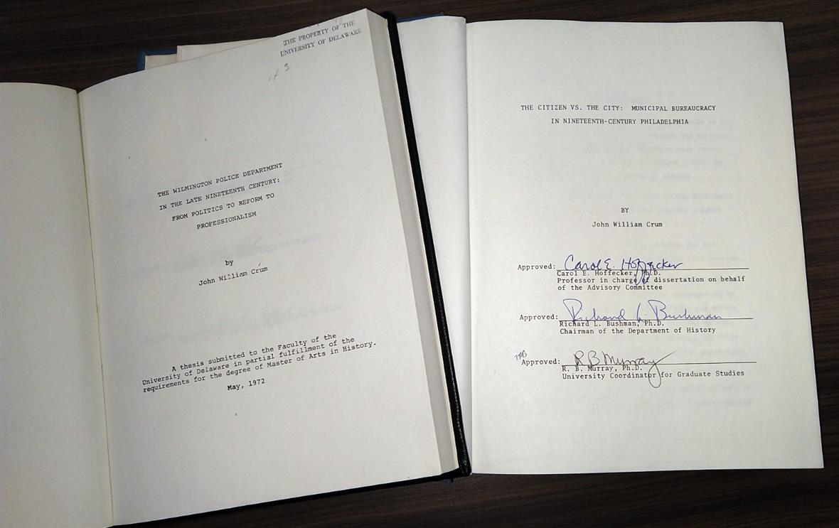 John Crum's title pages of his dissertation and thesis.